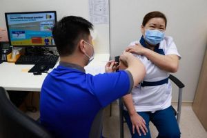 COVID-19 vaccine in Singapore. Photo from The Straits Times.