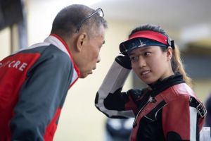 Tan pictured with her coach Song Haiping. Photo by The Straits Times.