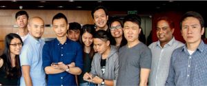 Lien We King (far right) pictured with the staff of Mothership.sg. Photo from Teo Yu Sheng.
