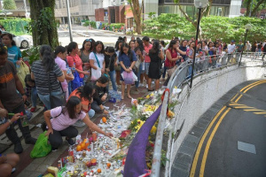 Lucky Plaza accident mourners.jpg