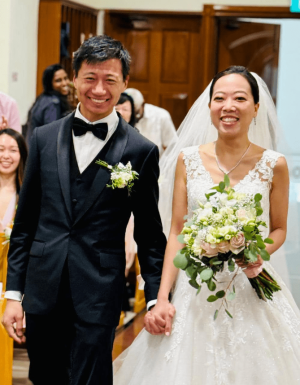 Edwina Yeo (right) pictured with her husband, David Cheng (left) at their May wedding dinner. Photo from Facebook.