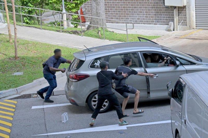 File:Kpod peddler fleeing raid Bishan.jpg