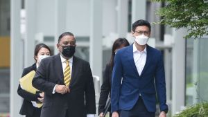 Ahmad Danial Mohamed Rafa’ee pictured arriving at the State Courts on July 6, 2022. Photo from CNA.